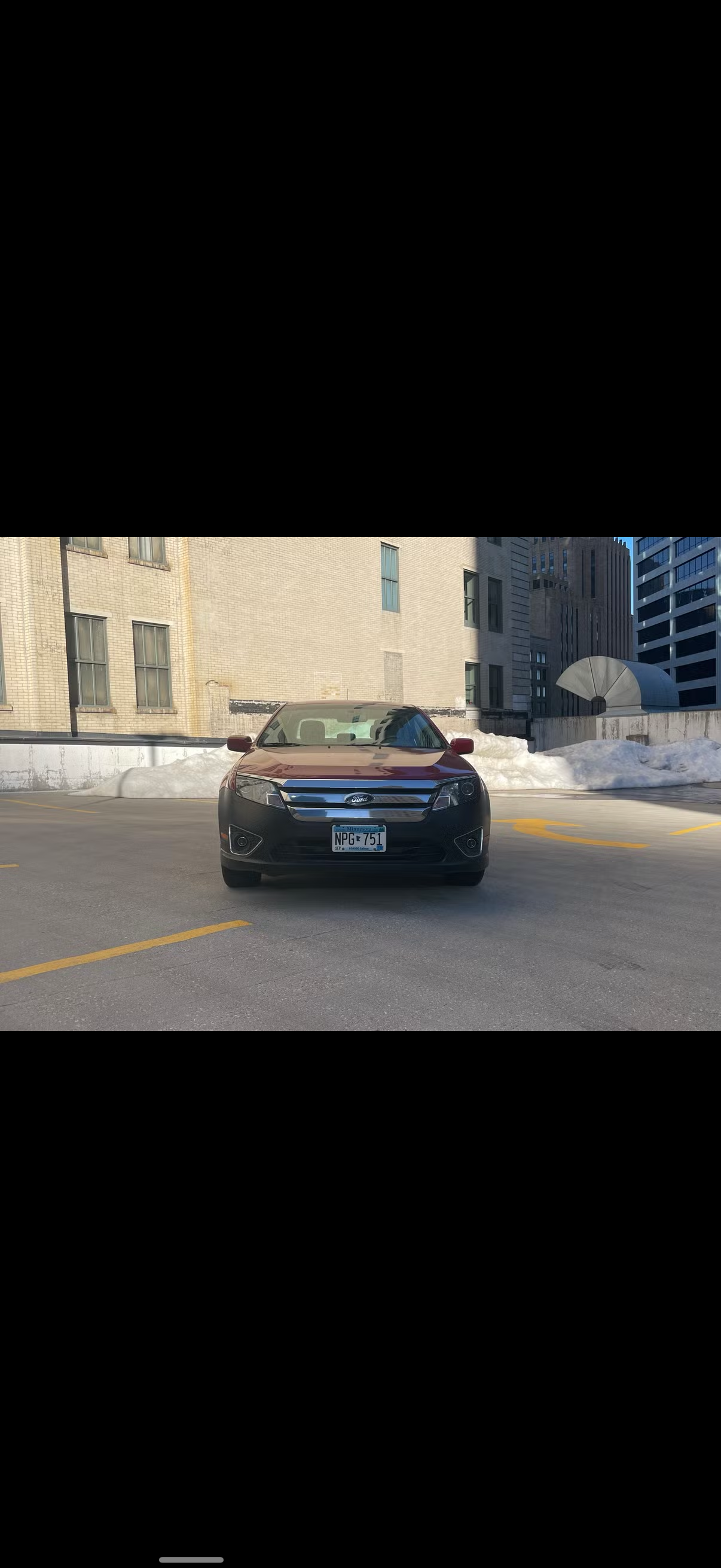 2012 Ford Fusion Hybrid rental - front view