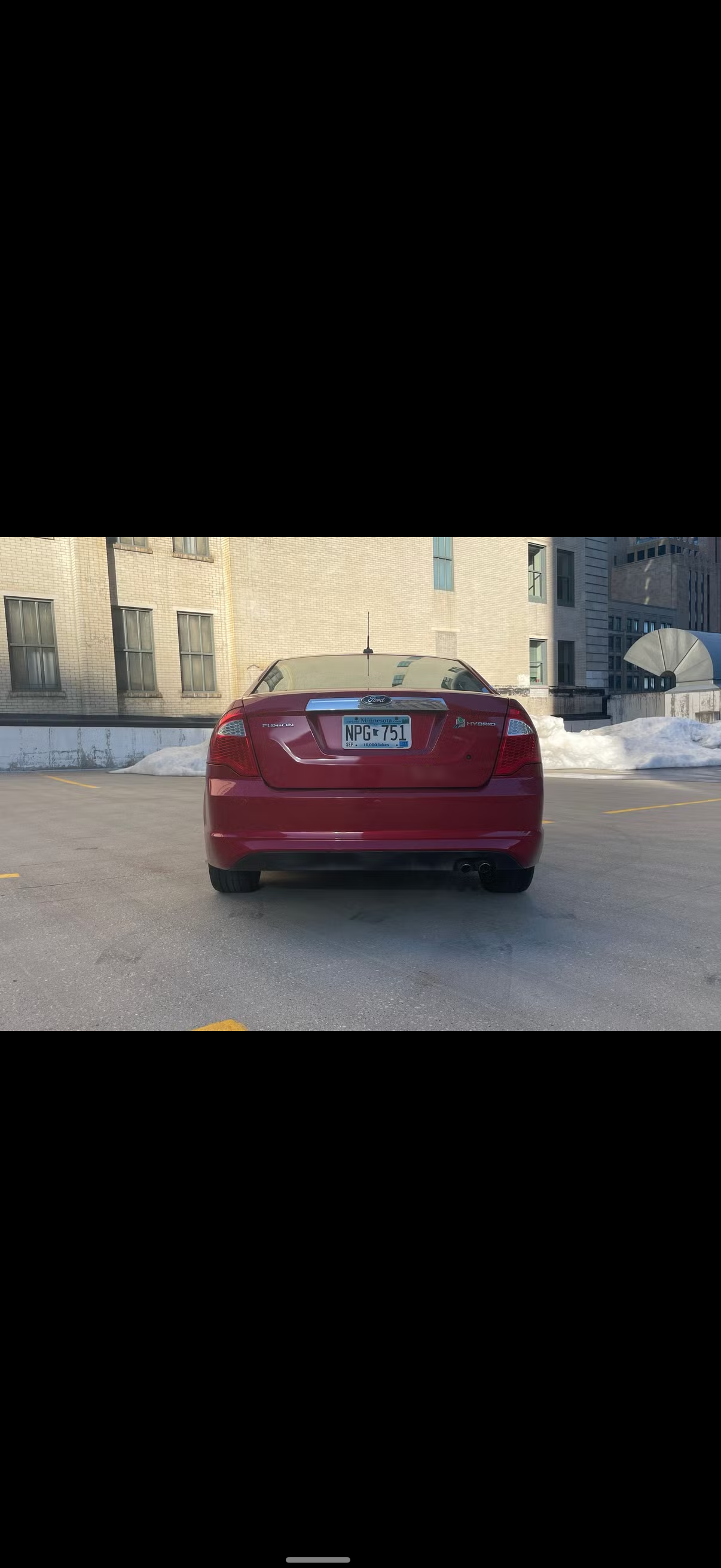 2012 Ford Fusion Hybrid rental - back interior view