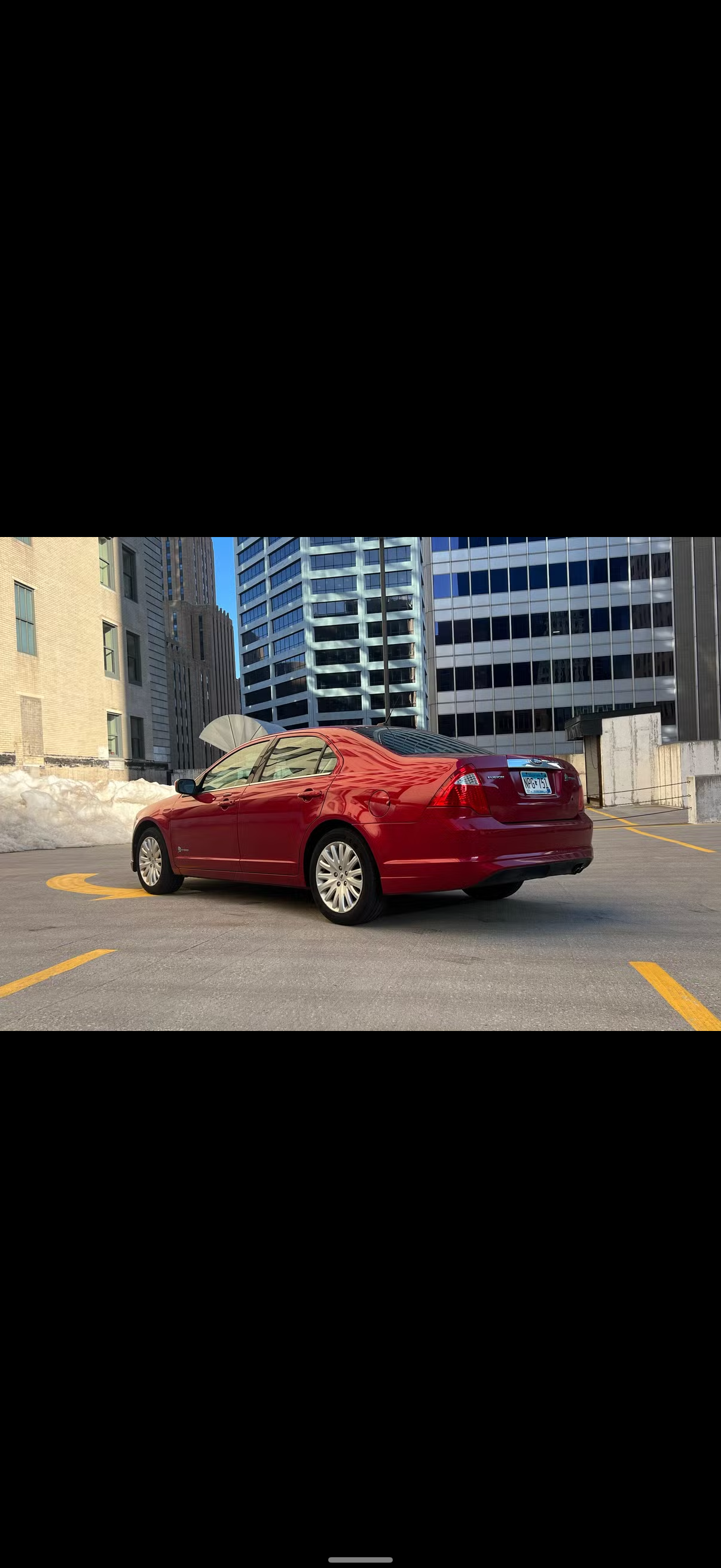 2012 Ford Fusion Hybrid rental - front interior view